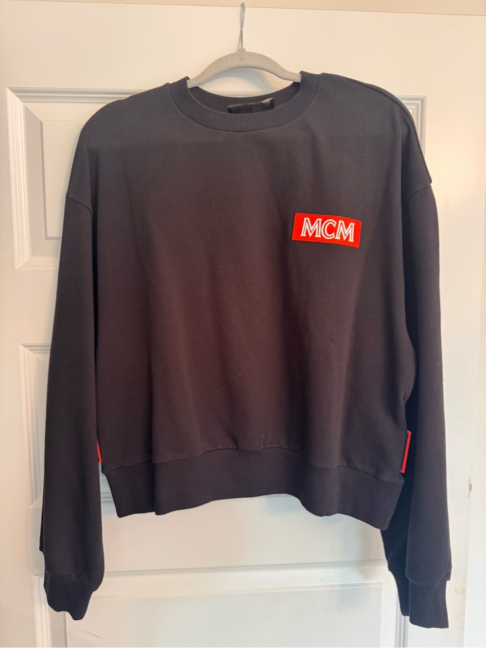 MCM Black Crewneck Sweatshirt with Red Logo Patch